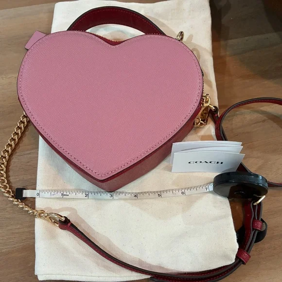 Coach Pink Heart-Shaped Crossbody Bag with Gold Accents. Beautiful timeless shap - Picture 3 of 6